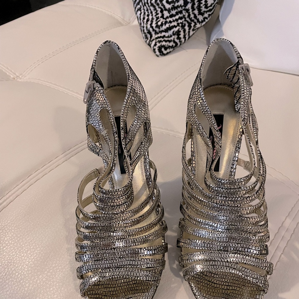 Black silver shoe only worn once comfortable.